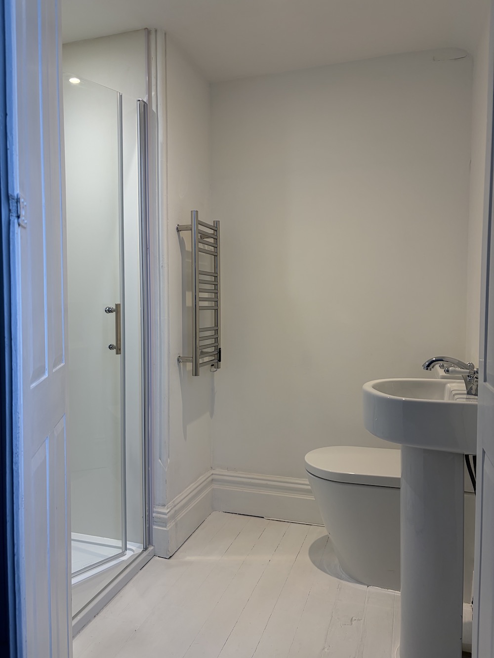 small shower room with basin and toilet